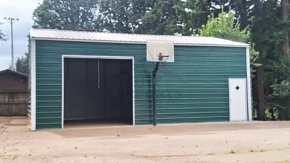 24x30x12 Vertical Roof Garage — 24'W x 30'L metal building from Get Carports