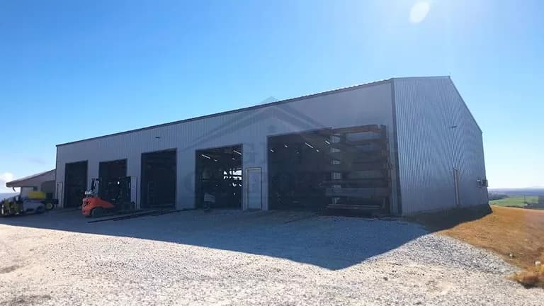 60x100x14 Commercial Clear Span Garage — 60'W x 100'L metal building from Get Carports